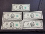 Lot of 5 $2 bills in plastic page from album crispy
