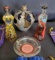 Crown Royal bags, metal crown, Madonna Inn ashtray, Mexican glass figures.