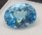 8.97cts oval cut Blue Topaz gemstone with gem ID card