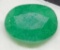 7.15ct oval cut green Emerald gemstone with ID card