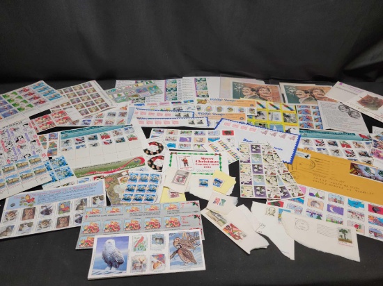 Stamp Sheets and collection stamps John Lennon Groucho Marx Christmas Flowers Trains