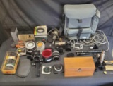 Camera lenses, microscope, microphones, Ameco code practice oscillator model ocm-2, camera bag.