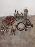 Oxygen and acetylene tanks, guages, hoses and tips. Milwaukee power unit electric with foot