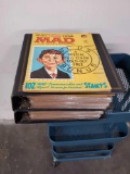 Two albums of MAD magazines.