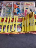 Superman comic book. The Flash comic book. Wacky packages sticker albums.