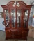 Two piece china cabinet with lighting and glass Shelving