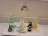 Salvador Ferragamo Chanel 5 Un Jadi Sur Li Nil perfumes Silvertone contents of bathroom cabinets
