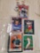 Box of 500+ football and baseball cards.