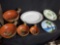 2 vintage serving platters. Set of 4 unique pottery bowls. 1 small decorative silver rim plate.