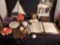 Mozart tin box. General Electric clock. Earnings. Wooden boat. Airforce memorabilia. Misc. Stuff.