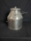 De Laval metal container with lid.