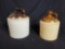 2 clay jugs with handles