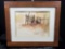 Framed art with signature.