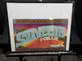 Framed Suavecito Pomade sign.