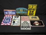 Lot of different size smaller metal signs.