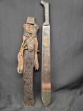 Machete In Vintage Leather Sheath