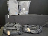 2 duffel bags.2 syntrific backpack computer bags.