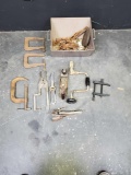 Bin of hand tools.C clamps. Vise grips. Wood plainer. Hand drill.