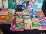 Box of vintage song sheets and books.