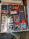 Over 500 baseball and football cards