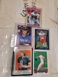 Box of 500+ football and baseball cards.