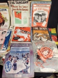 Vintage magazines and theater catalogs.