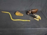 Wood carved rhino. Alligator head. Bird carving. Flexible wooden snake.