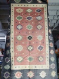 Indian style rug. 68in long