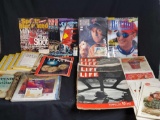 California speedway memorabilia. Vintage Coa Cola signs. The Death Of Superman comic books. Misc.
