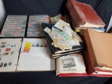 Box of vintage stamp albums.