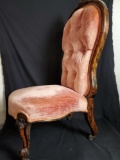 Vintage wood frame and upholstery chair with wheels