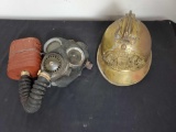 Old gas mask and unique handmade copper helmet.