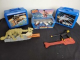 2 Aladdin G.I JOE boxes. Hot wheels starring Elvis. Mattel dinosaur. Fisher Price pop up toy.