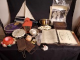 Mozart tin box. General Electric clock. Earnings. Wooden boat. Airforce memorabilia. Misc. Stuff.