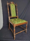 Vintage wood frame chair with green floral upholstery seat & back.
