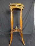 Vintage wooden Stand with metal rim.