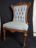 Vintage unique carved wood frame chair with upholstery seat and back.