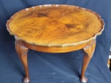 Quarter matched mahogany top pie crust table.