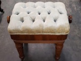 Vintage upholstery ottoman with adjustable height.