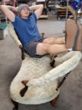 Unique Vintage wood and upholstery on wheels.