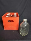 Plastic 6 pack of glass Silver Springs Water bottles with lids.