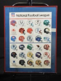 Framed poster of NFL team helmets.