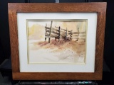 Framed art with signature.
