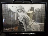 Framed poster print with signature.