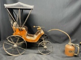 Old Carriage Wood and metal Decor Piece and an old GoldenRod oil can.