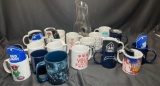 Lot Of Assorted Mugs, Glass Vase Pitcher and Soda Can Holders