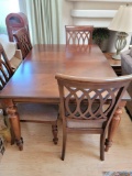 Beautiful table w 2 leafs and 4 chairs w Matching Buffet