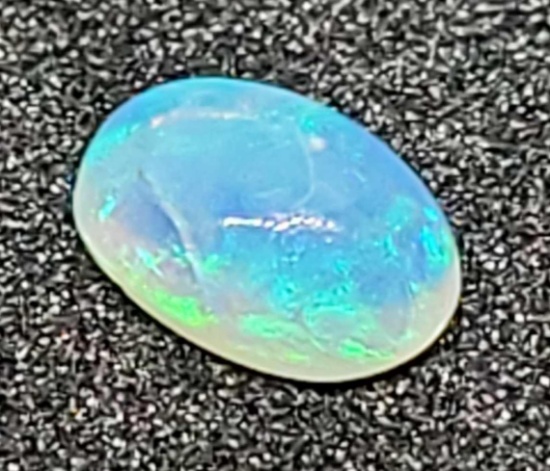 Beautiful Rainbow opal gemstone oval cut .50ct
