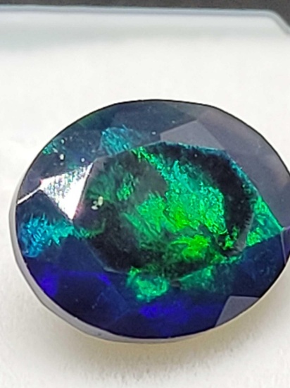 Black Opal Rare Earth Mined Polished Stunner 1.18ct Flashy color oval cut AAA beauty