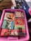 Pink bin of dvds popular titles